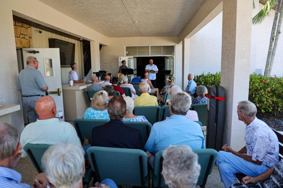 Southwest Baptist Church in Fort Myers, damaged by Hurricane Ian, held on outdoor service on Sunday to offer solace for a community shaken by loss.