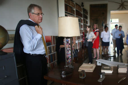 Chief Executive of Caterpillar Inc Doug Oberhelman visits the Ernest Hemingway Museum before a news conference in Havana, Cuba, May 11, 2016, REUTERS/Alexandre Meneghini