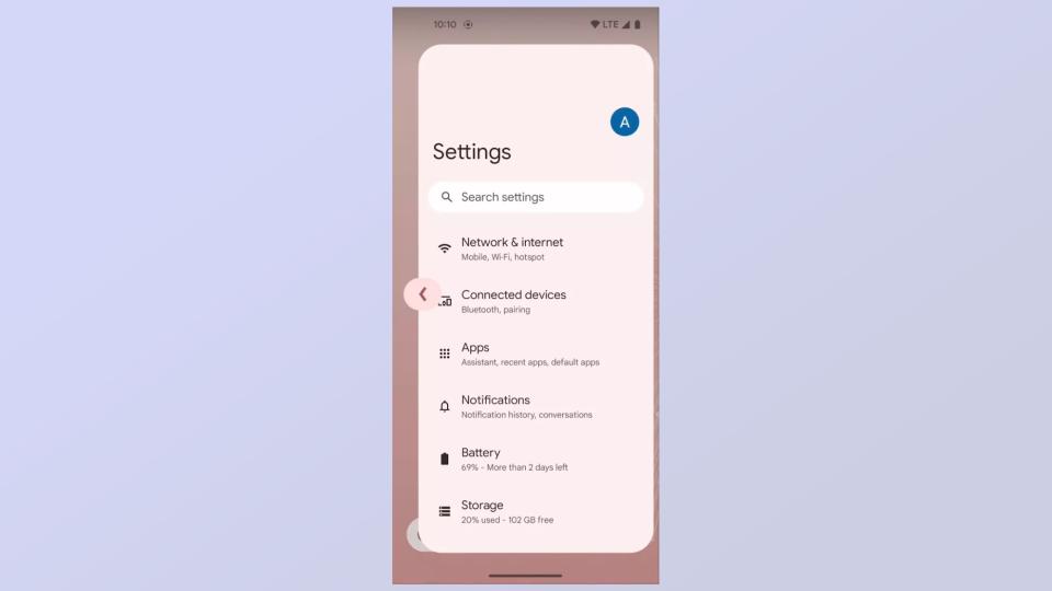 A screenshot from Android 14, showing the new back arrow that appears when using swipe gestures