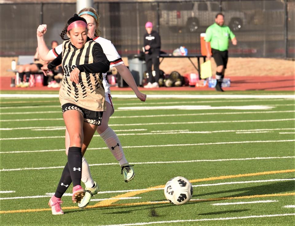 Abilene High's Laila Brown knocks the ball away from a Lubbock-Cooper en route to scoring her first of six goals just 54 seconds into the game.