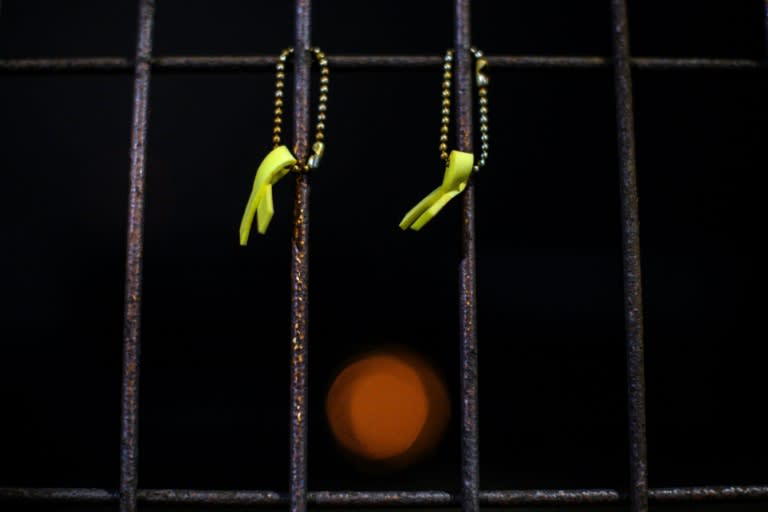 Yellow ribbons are displayed near the main gates at a port in South Jeolla Province, near where the salvaged Sewol ferry sits (ANTHONY WALLACE)