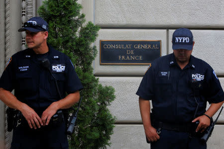 Members of the New York Police Department's Counterterrorism Unit guard the entrance at the Consulate General of France in Manhattan following the Nice terror attack in New York, U.S., July 15, 2016. REUTERS/Andrew Kelly