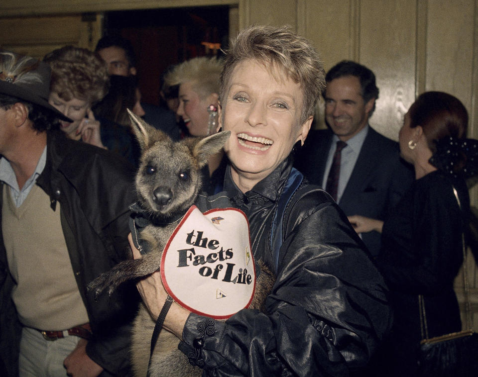 FILE - Actress Cloris Leachman, a star in the TV series "Facts of Life," hoists an Australian Wallaby by name of Skippy on Thursday Feb. 13, 1987, during a celebration at Chasen's in Beverly Hills of her 40 years in show business. Leachman, a character actor whose depth of talent brought her an Oscar for the "The Last Picture Show" and Emmys for her comedic work in "The Mary Tyler Moore Show" and other TV series, has died. She was 94. (AP Photo/Michael Tweed, FILE)