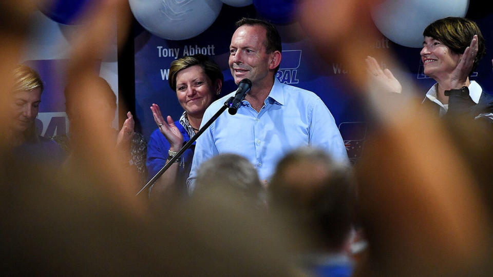 Former Prime Minister and Warringah Liberal candidate Tony Abbott (left) is joined on stage by his wife Margie (right) and sister Christine Forster (second eft)  after conceding defeat at Manly Leagues Club in Brookvale, Sydney, Saturday, 18 May, 2019. Approximately 16.5 million Australians have voted  in what is tipped to be a tight election contest between Australian Prime Minister Scott Morrison and Australian Opposition leader Bill Shorten. (AAP Image/Bianca De Marchi) NO ARCHIVING