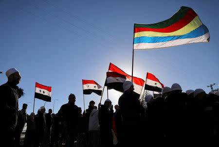 Druze Arabs on the Israeli-occupied Golan Heights hold an anti-election protest outside a municipal polling station in Majdal Shams, October 30, 2018 REUTERS/Ammar Awad