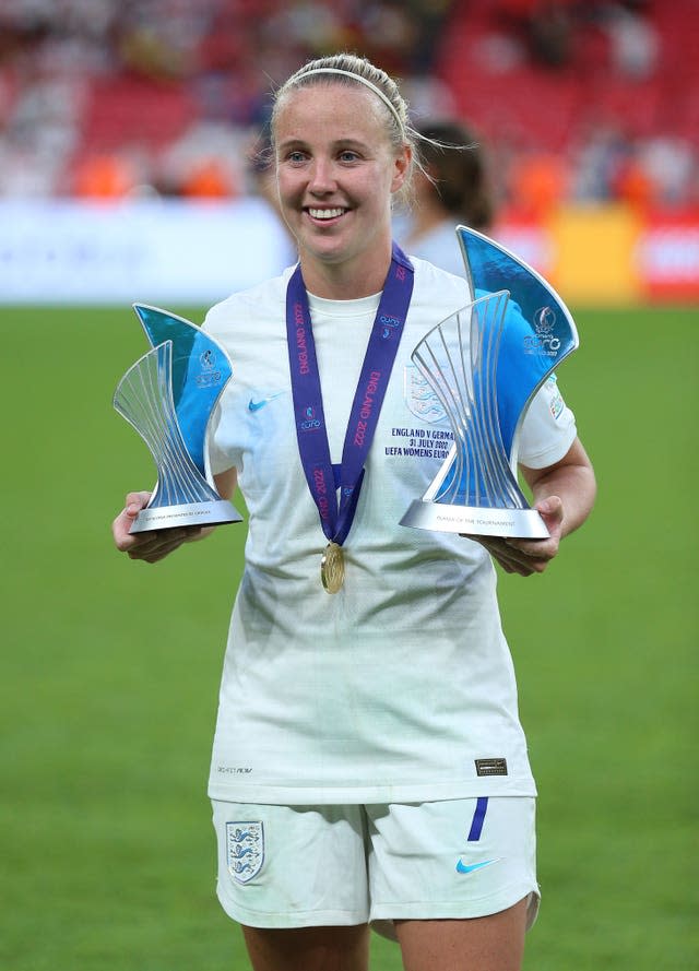 Beth Mead with her top scorer and player of the tournament trophies