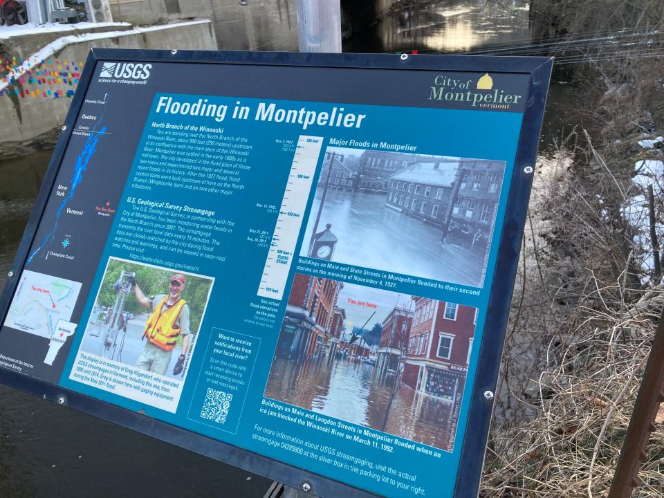 A sign near the North Branch of the Winooski River in Montpelier, shown Dec. 15, 2023, details the history of flooding in Vermont's capital city.