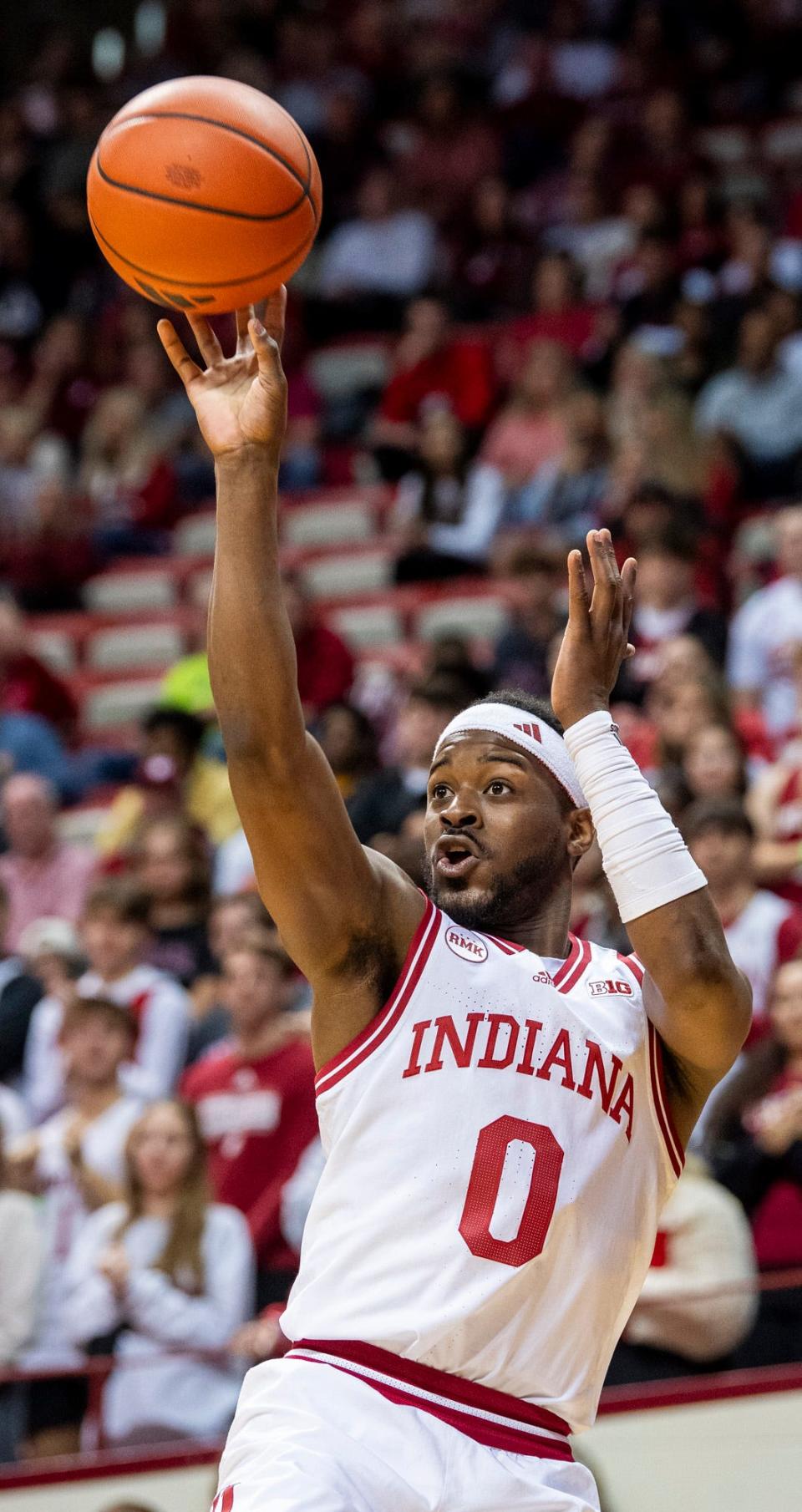 Indiana's Xavier Johnson (0) shoots during the first half of the Indiana versus Marian men's basketball game at Simon Skjodt Assembly Hall on Friday, Nov. 3, 2023.