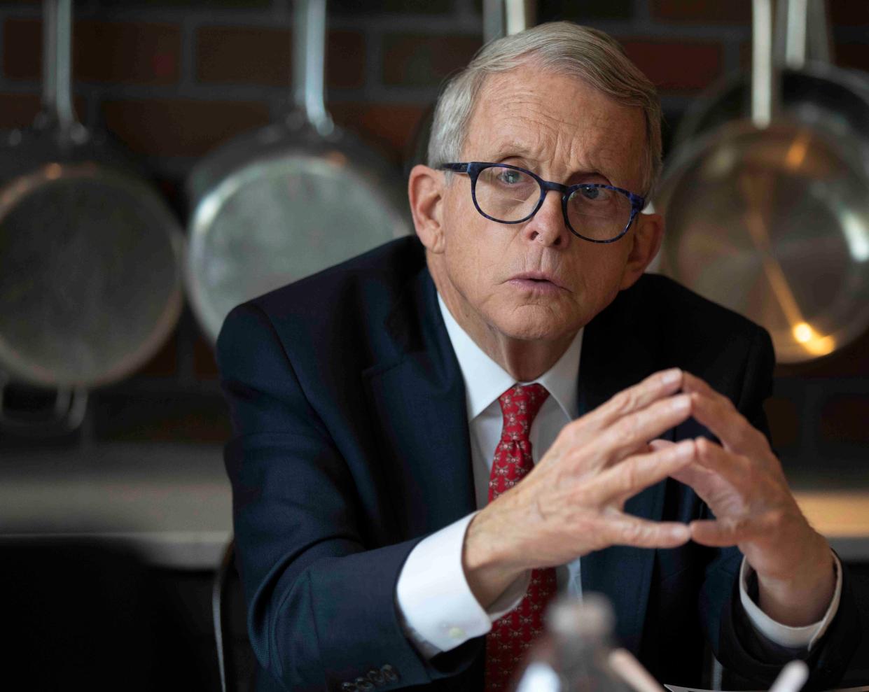 Ohio Gov. Mike DeWine takes part in a discussion at La Soupe in Walnut Hills, hosted by Suzy DeYoung, founder and CEO or La Soupe, November 9, 2021. La Soupe, founded in 2014, rescues food bound for the landfill and turns it into healthy soups and meals for the food insecure. 