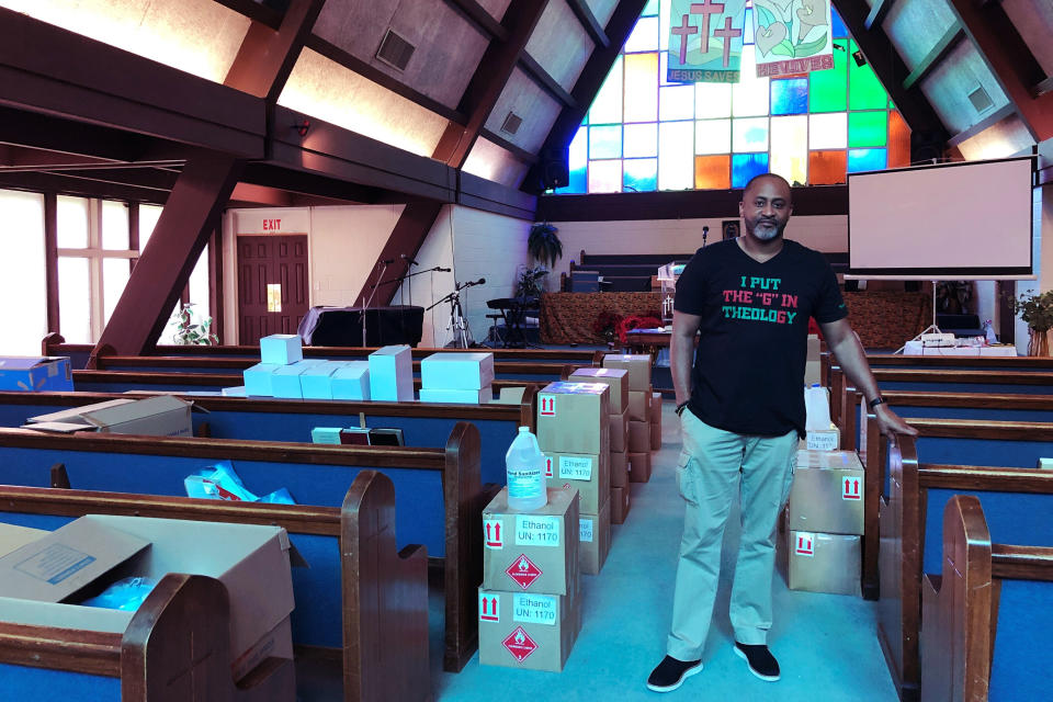 Earle Fisher, a pastor and civil rights activist, poses inside Abyssinian Missionary Baptist Church on Sunday, July 12, 2020, in Memphis, Tenn. Fisher is a plaintiff in a lawsuit seeking to open up mail-in voting to all eligible voters in Tennessee. (AP Photo/Adrian Sainz)