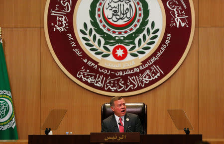 Jordan's King Abdullah II speaks during the 28th Ordinary Summit of the Arab League at the Dead Sea, Jordan March 29, 2017. REUTERS/Mohammad Hamed