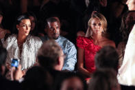 NEW YORK, NY - SEPTEMBER 12: (L-R) Television perosnality Kim Kardashian, vocalist Kanye West and actress Stacy Keibler attend the Marchesa spring 2013 fashion show during Mercedes-Benz Fashion Week at Vanderbilt Hall at Grand Central Terminal on September 12, 2012 in New York City. (Photo by Chelsea Lauren/Getty Images)