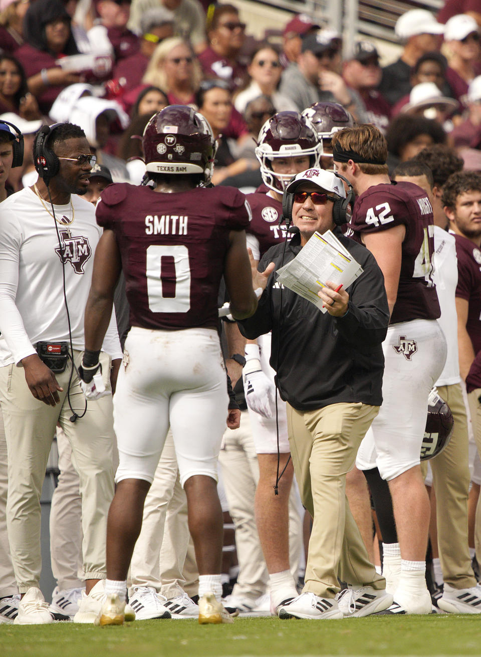 Oct 28, 2023; College Station, Texas; Texas A&M Aggies head coach Jimbo Fisher talks to wide receiver Ainias Smith (0) between plays against the South Carolina Gamecocks during the second quarter at Kyle Field. Dustin Safranek-USA TODAY Sports
