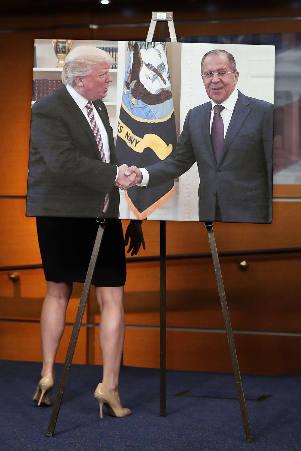 <p>MAY 17, 2017 – House Democrats display a photograph of President Donald Trump welcoming Russian Foreign Minister Sergey Lavrov to the White House during a news conference at the U.S. Capitol in Washington, DC. House Democrats have introduced legislation to create an outside, independent commission to investigate possible connections between President Donald Trump and Russian officials. If Speaker Paul Ryan (R-WI) does not support the legislation then Democrats said they will file a discharge petition to force a vote on the measure. (Photo: Chip Somodevilla/Getty Images) </p>