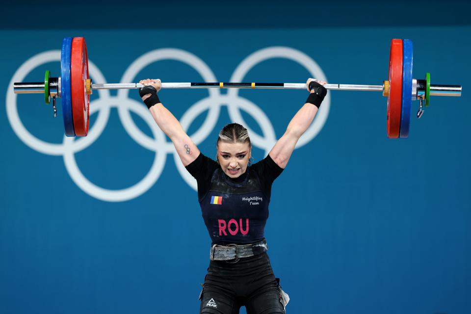 9 Olympic weightlifting photos of lifters making the most intense faces