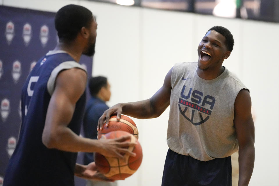 USA player Anthony Edwards, right, talks during a practice session ahead of the Basketball World Cup in Taguig, Thursday, Aug. 24, 2023. (AP Photo/Aaron Favila)