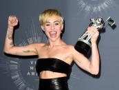 <p>The former Disney Channel star has the roman numerals, "VIIXCI" on the inside of her left elbow. Below the numbers, Miley has a drawing of an <a href="http://www.digitalspy.com/showbiz/news/a466295/miley-cyrus-gets-leonardo-da-vinci-heart-tattoo-from-kat-von-d/" rel="nofollow noopener" target="_blank" data-ylk="slk:anatomical heart by Leonardo da Vinci;elm:context_link;itc:0;sec:content-canvas" class="link ">anatomical heart by Leonardo da Vinci</a> tatted on by none other than Kat Von D. </p><p>On the inside of her right bicep, Miley has a tattoo to honor her father, Billy Ray, and singer Johnny Cash. In a 2017 <em><a href="https://www.billboard.com/articles/news/magazine-feature/7783997/miley-cyrus-cover-story-new-music-malibu" rel="nofollow noopener" target="_blank" data-ylk="slk:Billboard;elm:context_link;itc:0;sec:content-canvas" class="link ">Billboard</a> </em>cover interview, Miley said, "I’ve got a tattoo of Johnny Cash’s autograph that he gave me when I was a ­little girl that says, 'I’m in your corner.'"</p>