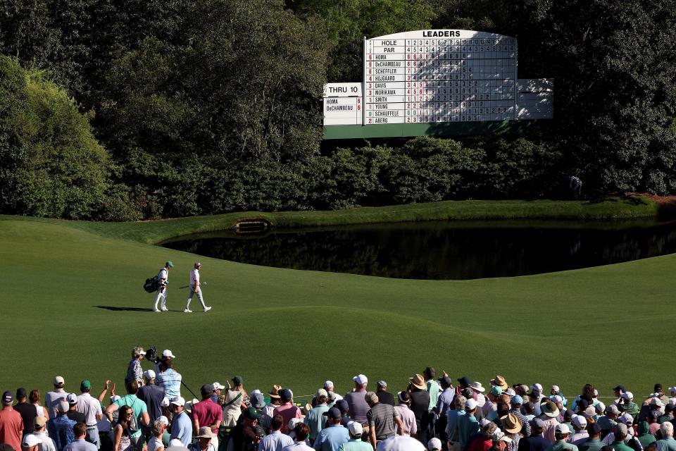 Bryson DeChambeau walks across the 11th hole during the third round of the 2024 Masters Tournament at Augusta National Golf Club. (Jamie Squire/Getty Images)