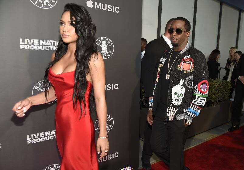 Cassie Ventura, left, and Sean "Diddy" Combs arrive at the Los Angeles premiere of "Can't Stop, Won't Stop: A Bad Boy Story" at the Writers Guild Theater on Wednesday, June 21, 2017, in Beverly Hills, Calif. (Photo by Chris Pizzello/Invision/AP)