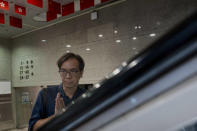 Chung Pui-kuen, the ex-chief editor of the now shuttered Stand News online outlet, outside the district court, in Hong Kong on Thursday, Aug. 29, 2024. (AP Photo/Billy H.C. Kwok)