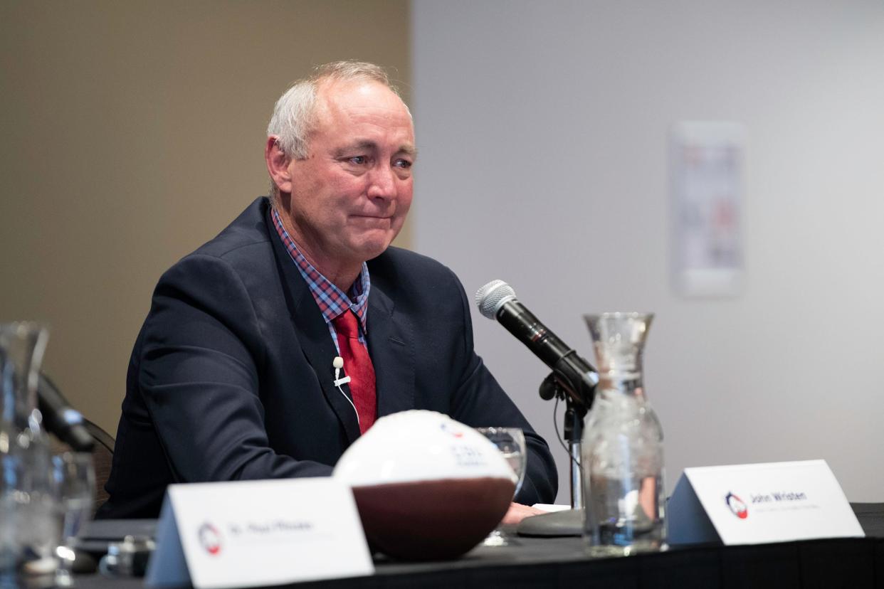 John Wristen gets emotional during a press conference announcing his retirement as head football coach at Colorado State University Pueblo on Tuesday, Dec. 13, 2022.