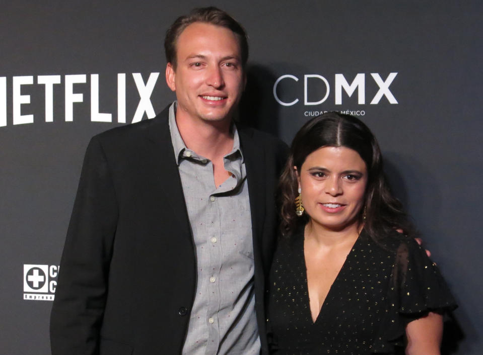 FILE - In this Nov. 21, 2018 file photo, Roma film producers Nicolas Celis, of Mexico, and Gabriela Rodriguez, of Venezuela, pose on the red carpet, in Mexico City. As the producer of "Roma," Rodriguez is the first Latino woman nominated to the Oscars for best picture. The Academy Awards are Sunday, Feb. 24 (AP Photo/Berenice Bautista, File)