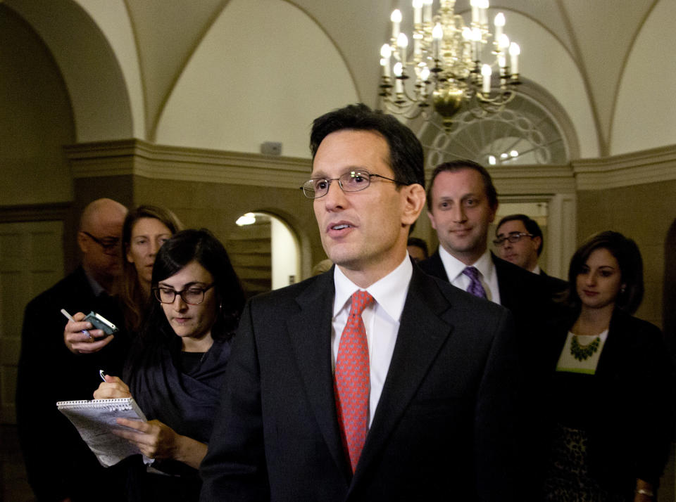 House Majority Leader Eric Cantor of Virginia, is followed by reporters as he leaves Capitol Hill, Tuesday, Oct. 15, 2013, in Washington. (AP Photo/Carolyn Kaster)