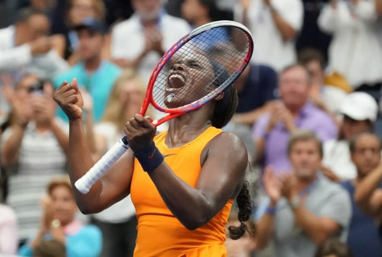 Match point: Defending champion Sloane Stephens celebrates US Open third-round victory over Victoria Azarenka on Friday