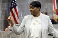 Assistant State Attorney Pascale Achille gives her opening statement in the during the XXXTentacion murder trial at the Broward County Courthouse in Fort Lauderdale, Fla., Tuesday, Feb. 7, 2023. Emerging rapper XXXTentacion, born Jahseh Onfroy, 20, was killed during a robbery outside of Riva Motorsports in Pompano Beach in 2018, allegedly by defendants Michael Boatwright, Trayvon Newsome, and Dedrick Williams. (Amy Beth Bennett/South Florida Sun-Sentinel via AP, Pool)