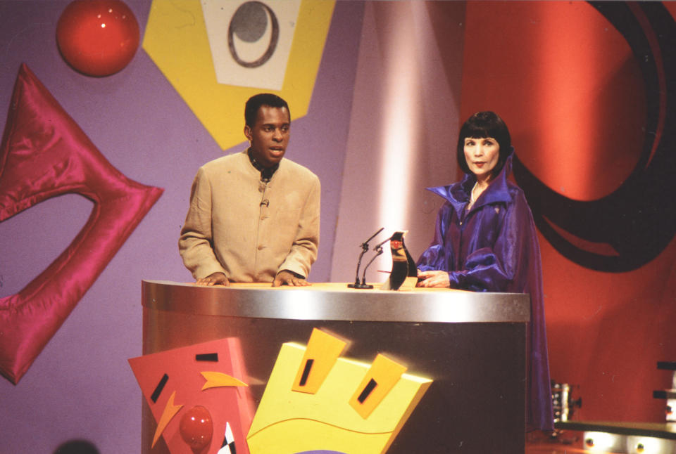 ENGLAND - MAY 29: Andi Peters and Mystic Meg on stage at the Live and Kicking Red Nose Awards show broadcast in 1995, honoring the films, television programmes, pop acts and personalities voted for by children in 1995, England. (Photo by Mauro Carraro/Comic Relief via Getty Images)