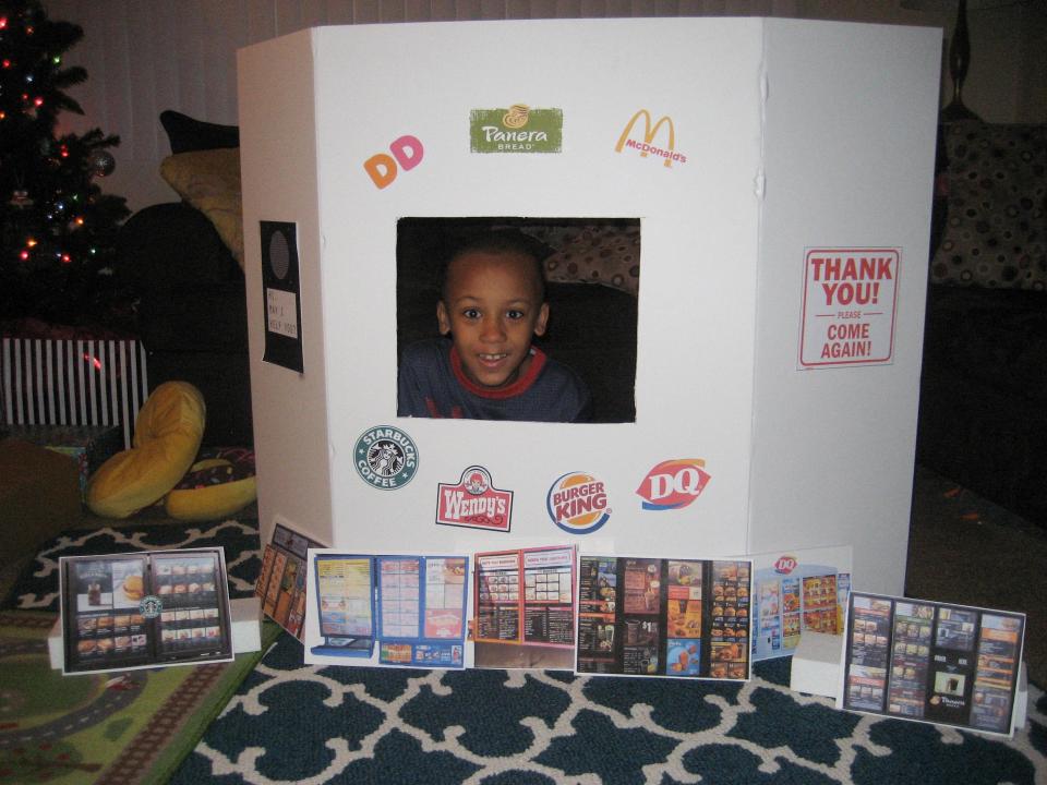 Rochester artist Quajay Donnell faced a challenge when his son asked for a restaurant drive-thru for Christmas in 2015. After finding you can’t simply buy a toy drive-thru on the internet, he made one on his own, much to his son’s delight on Christmas morning.