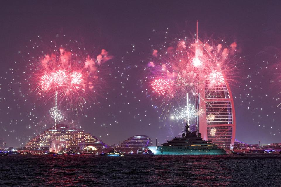 Fireworks light up the sky at the landmark Burj al-Arab luxury hotel tower in Dubai (AFP via Getty Images)