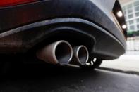 Exhaust pipes of a car are pictured in London