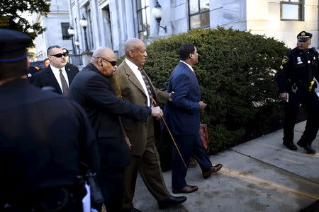 Actor and comedian Bill Cosby (3rd R) arrives for a preliminary hearing on sexual assault charges at the Montgomery County Courthouse in Norristown, Pennsylvania February 2, 2016. REUTERS/Mark Makela