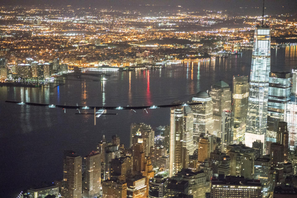 <p>The lights of New York City twinkle as Solar Impulse 2 glides over the skyscrapers en route to JFK airport. (Solar Impulse/Revillard/Rezo.ch)</p>