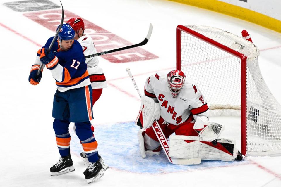 Apr 25, 2024; Elmont, New York, USA; Carolina Hurricanes goaltender Frederik Andersen (31) makes a save against the New York Islanders during the first period in game three of the first round of the 2024 Stanley Cup Playoffs at UBS Arena. Mandatory Credit: Dennis Schneidler-USA TODAY Sports