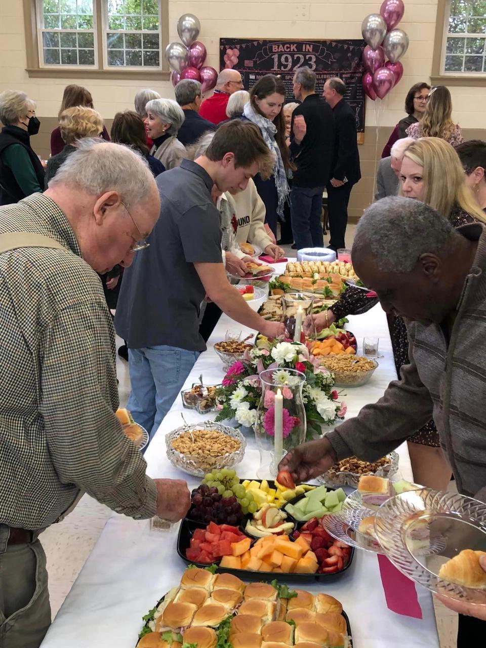 Guests enjoy the luncheon at Arlene Layne Stanton's 100th birthday celebration in Chester on December 28, 2023.