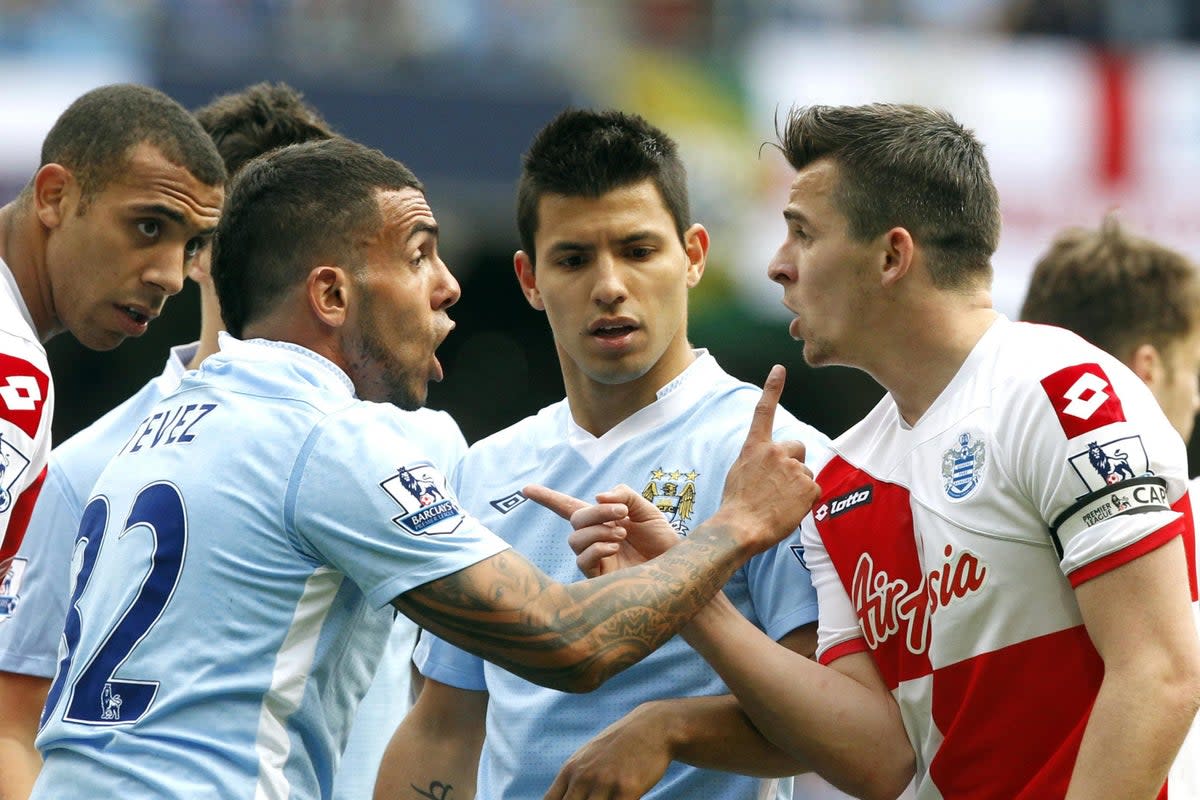 QPR’s Joey Barton argues with Manchester City’s Carlo Tevez before being sent off (Peter Byrne/PA) (PA Archive)