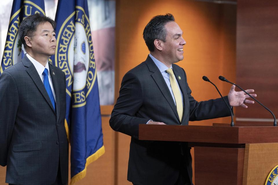 Democratic Caucus Chair Rep. Pete Aguilar, D-Calif., flanked by Rep. Ted Lieu, D-Calif., speaks during a news conference after a democratic caucus meeting on Capitol Hill, Wednesday, Jan. 4, 2023, in Washington. (AP Photo/Jose Luis Magana)