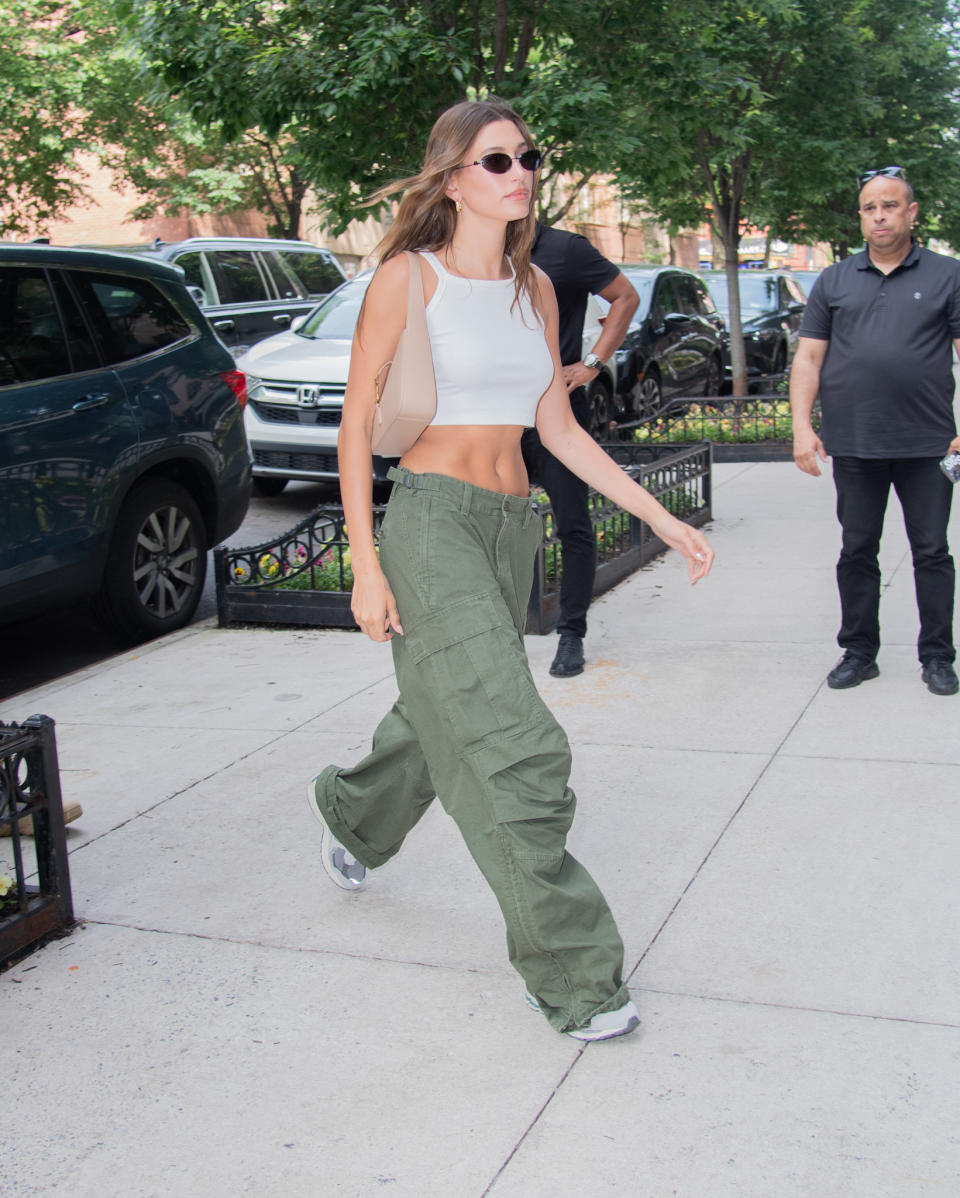 Bieber in Brooklyn on June 3, wearing a pair of low-rise, baggy cargo pants that are becoming a defining trend of summer ’22 that is sure to continue into the fall. - Credit: WavyPeter / SplashNews.com