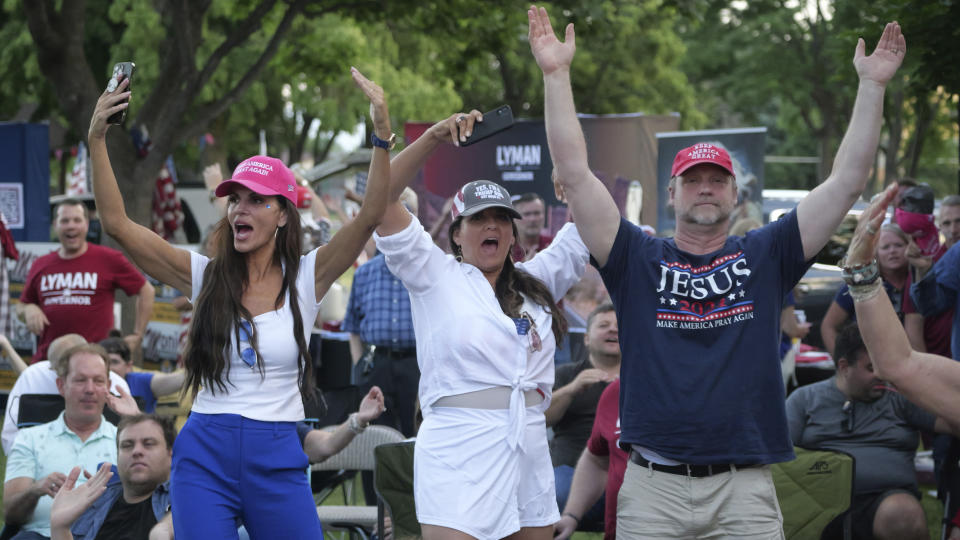 Republican voters attend a rally for Trump-backed U.S. Senate candidate Trent Staggs and others on June 14, 2024, in Orem, Utah. Tuesday's primary election will determine if the state wants another moderate conservative like Romney or a farther-right candidate more willing to fall in line with former President Donald Trump. (AP Photo/Rick Bowmer)