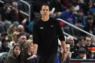 Miami Heat head coach Erik Spoelstra watches against the Detroit Pistons in the first half of an NBA basketball game in Detroit, Sunday, March 17, 2024. (AP Photo/Paul Sancya)