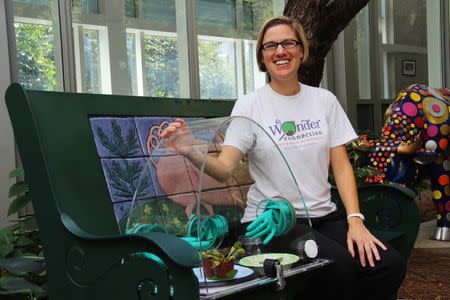 Science teacher Katie Stoudemire poses with the WonderSphere in this undated handout photo. Photo courtesy of Alyssa LaFaro, UNC Research via REUTERS