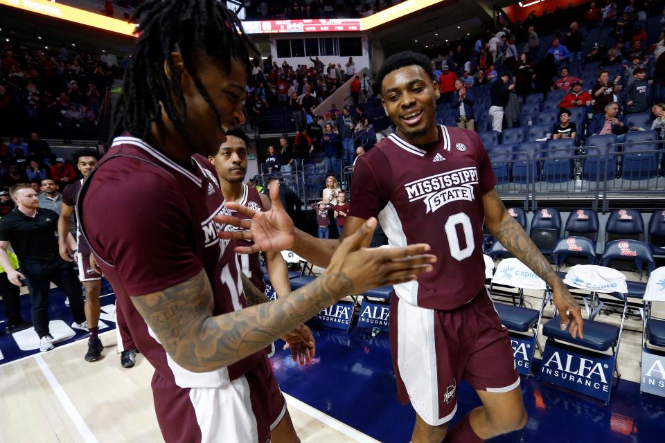 Feb 18, 2023; Oxford, Mississippi, USA; Mississippi State Bulldogs forward D.J. Jeffries (0) reacts with forward Tyler Stevenson (14) after defeating the Mississippi Rebels at The Sandy and John Black Pavilion at Ole Miss. Mandatory Credit: Petre Thomas-USA TODAY Sports