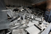 Laptop waste at WEEE center recycling plant, a collection point where people can deposit old electric equipment in Nairobi, Kenya Wednesday, March. 20, 2024. U.N. agencies have warned that electrical and electronic waste is piling up worldwide while recycling rates continue to remain low and are likely to fall even further. (AP Photo/Brian Inganga)