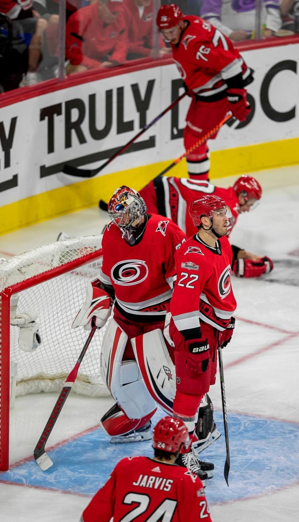 The Carolina Hurricanes Brett Pesce (22) checks the video replay after a goal by New York Islanders Brock Nelson (29). The initial shot hit the Carolina Hurricanes Sebastian Aho (20) in the face, falling perfectly for Nelson in the first period during Game 5 of their Stanley Cup series on Tuesday, April 25, 2023 at PNC Arena in Raleigh, N.C.