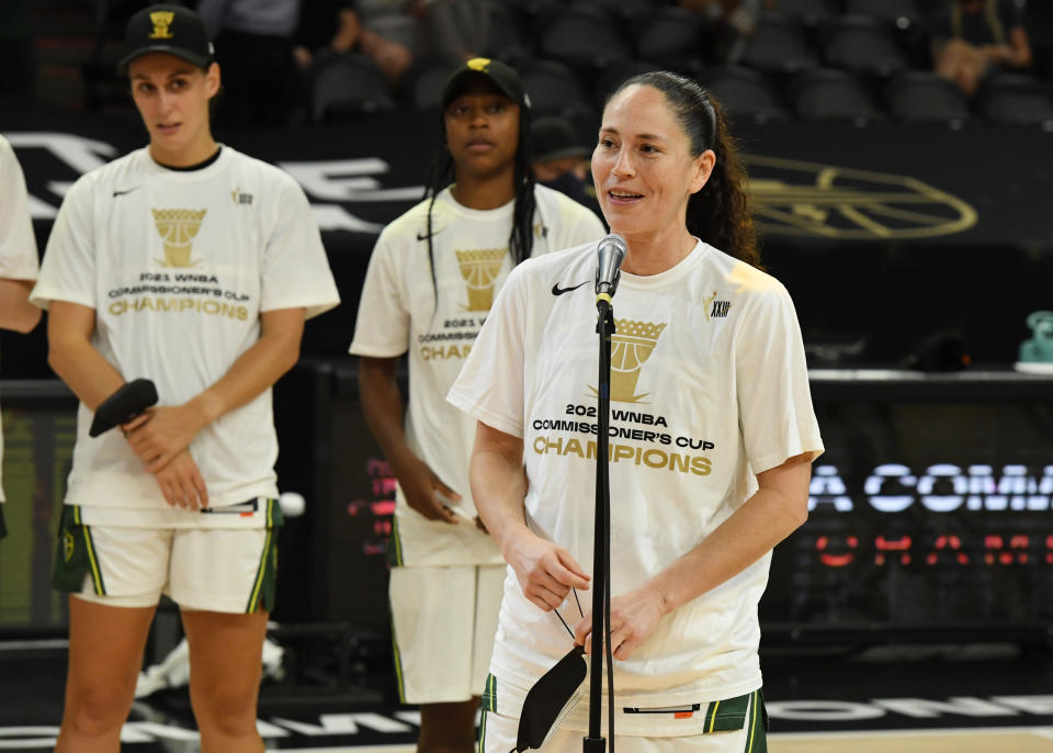 PHOENIX, ARIZONA - AUGUST 12: Sue Bird #10 of the Seattle Storm celebrates with teammates after a 79-59 win against the Connecticut Sun during the 2021 Commissioner's Cup Championship Game at Footprint Center on August 12, 2021 in Phoenix, Arizona. (Photo by Norm Hall/Getty Images)