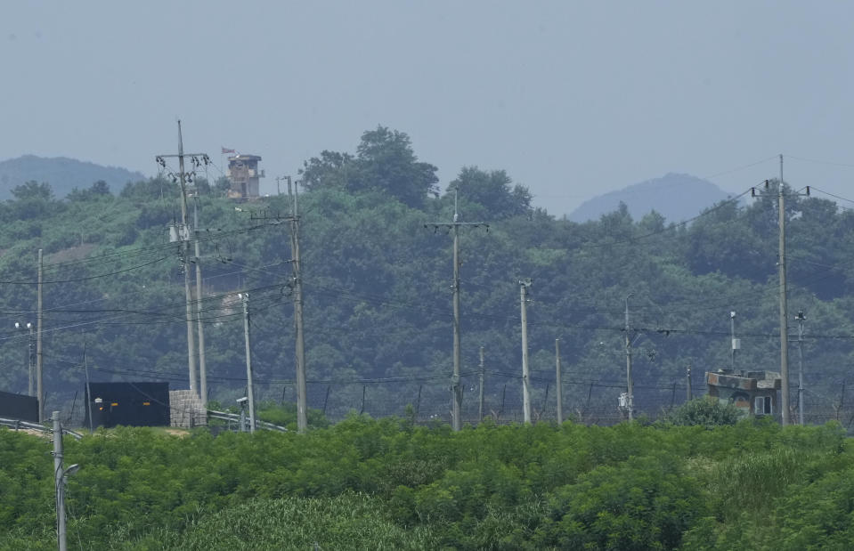 A North Korean military guard post, top left, and South Korea post, bottom right, are seen in Paju near the border with North Korea, South Korea, Wednesday, July 19, 2023. North Korea was silent about the highly unusual entry of an American soldier across the Koreas' heavily fortified border although it test-fired short-range missiles Wednesday in its latest weapons display. (AP Photo/Ahn Young-joon)