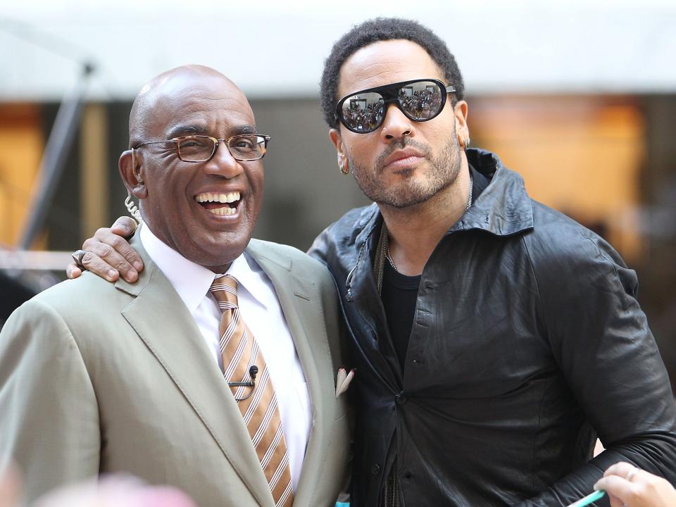 Lenny Kravitz shares a laugh with his uncle, Today Show host Al Roker, when Lenny Kravitz performs on NBC's "Today" at Rockefeller Plaza on September 2, 2011