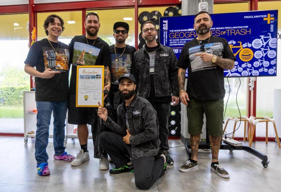 David Anasagasti, far right, alongside the Discord Moderators for his project pose with the Proclamation making July 30th Geographies of Trash day in recognition of the “Geographies of Trash: Art Cycling With Ahol Sniffs Glue” initiative developed during his RA+DI Entrepreneurial Residency at FIU Biscayne Bay Campus in North Miami, Florida, on Monday, July 17, 2023.